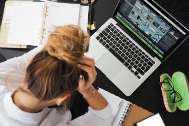 Working Woman Appears Anxious And Stressed Out